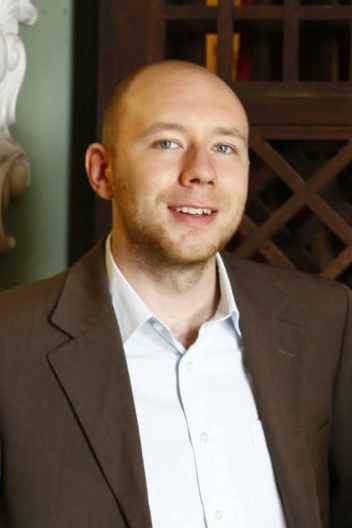 Professional headshot of Joshua Obritsch